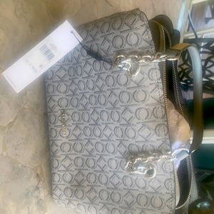 Brand new with tags Calvin Klein purse.